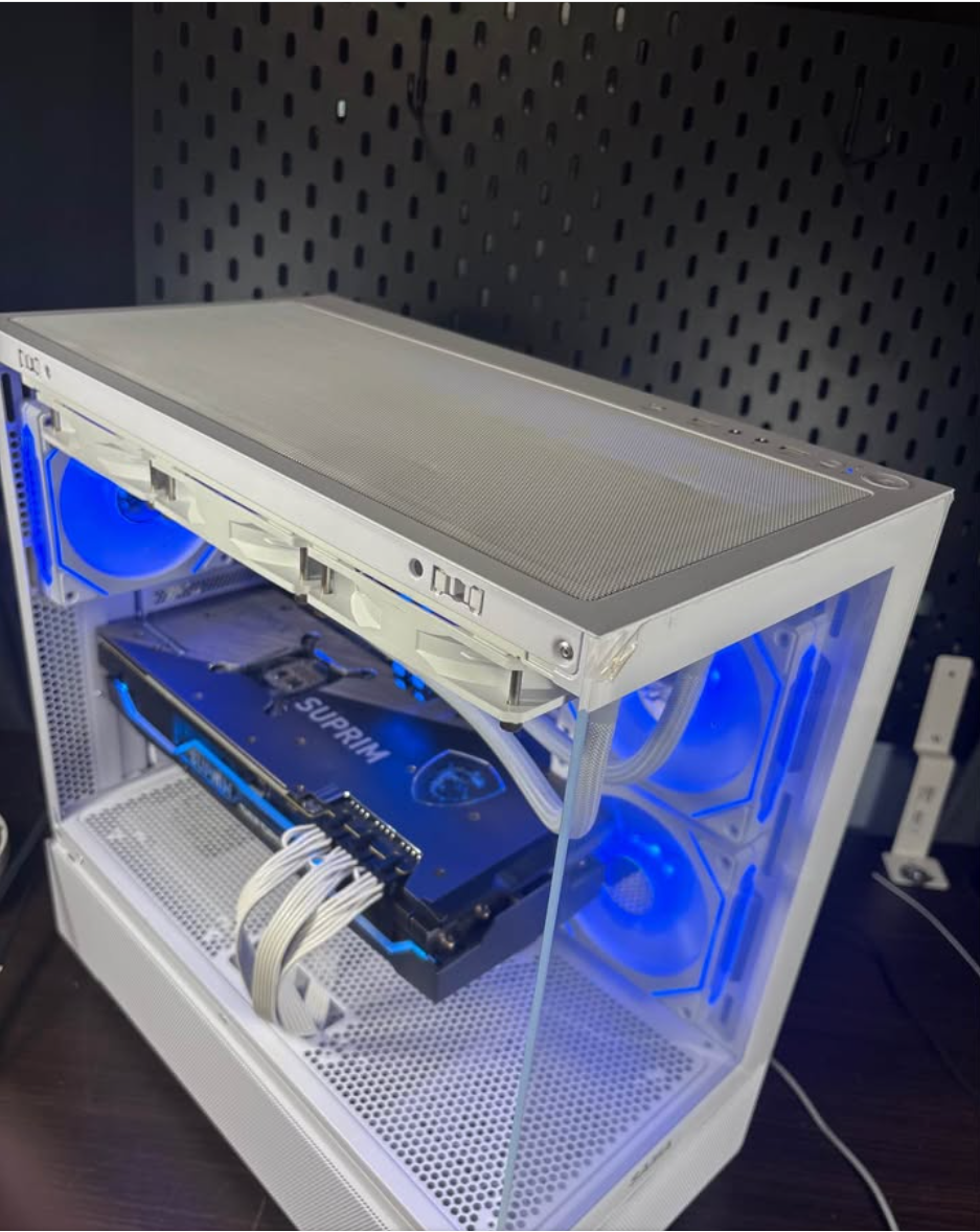 Custom gaming PC with blue RGB lighting – side view