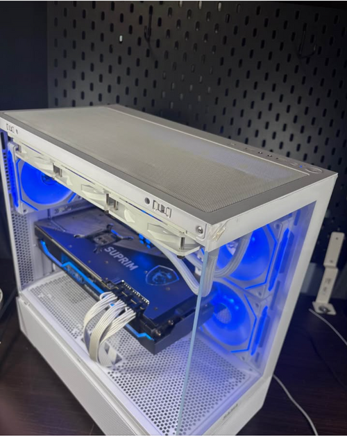 Custom gaming PC with blue RGB lighting – side view