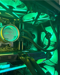 Custom gaming PC interior with green RGB lighting